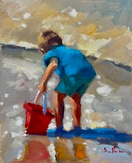 Boy with red bucket